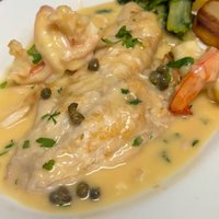 Fresh seafood, perfectly prepared fish, and a table waiting for you. Spend your evening ...
